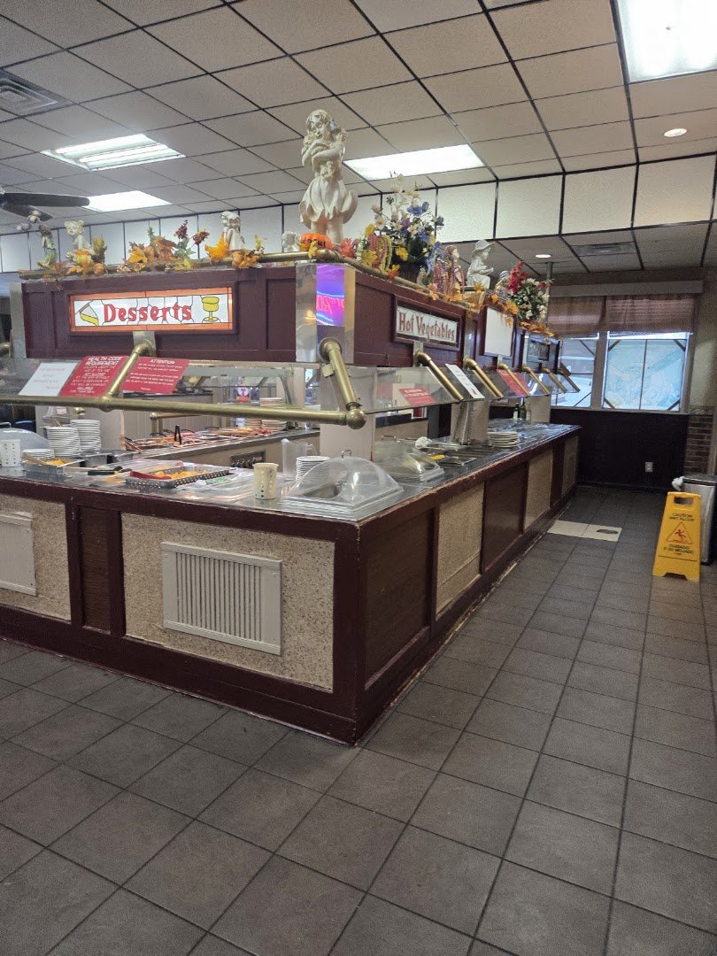 Family restaurant interior with simple seating.