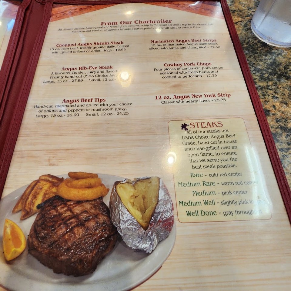 Restaurant menu featuring sandwiches and chicken.