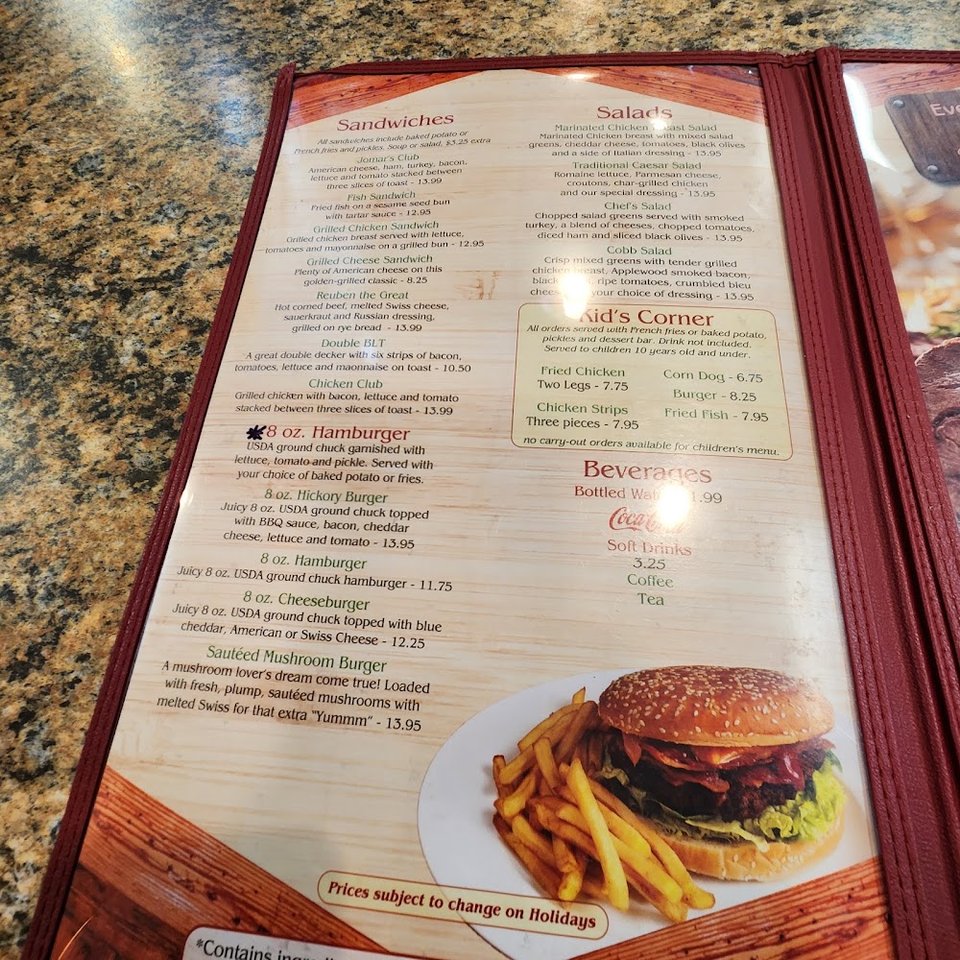 Menu layout with breakfast plates and fried fish.